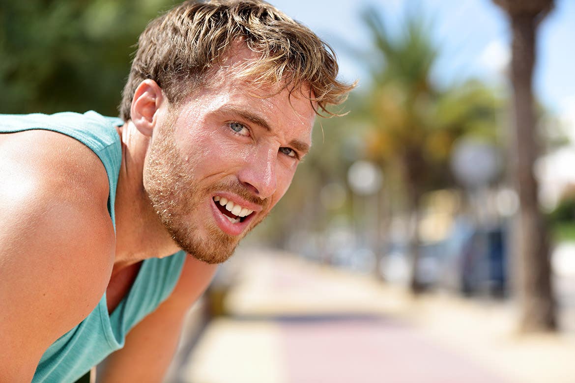 man tired from running